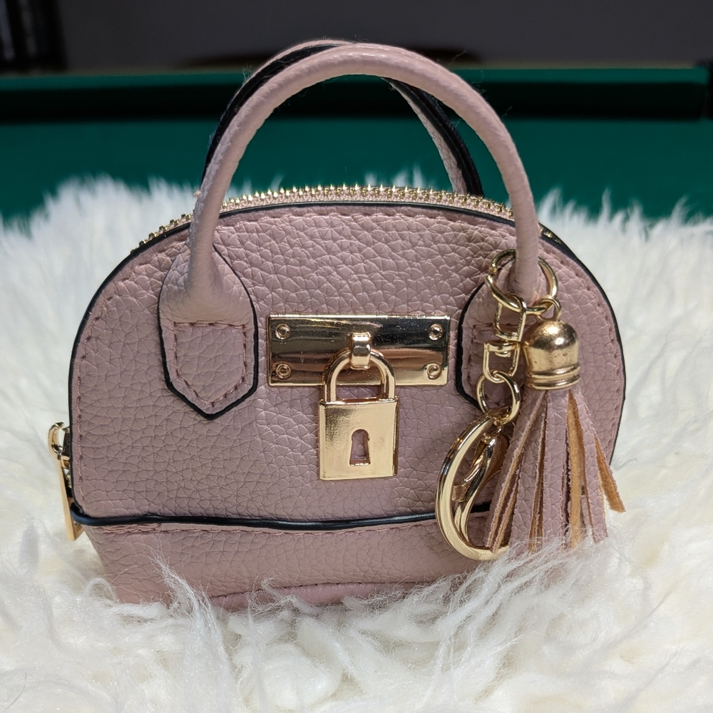 Pink Handbag with Gold Accents